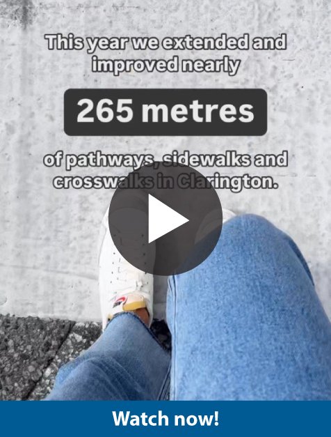 Video thumbnail - Overhead view of someone's feet walking on a sidewalk and the text "This year we extended and improved nearly 265 metres of pathways and crosswalks in Clarington.with a play button over top. Text: Watch now!