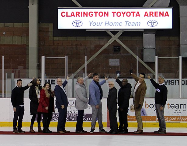 Clarington Mayor Adrian Foster, members of Council and representatives of Clarington Toyota unveil the rebranded Clarington Toyota Arena