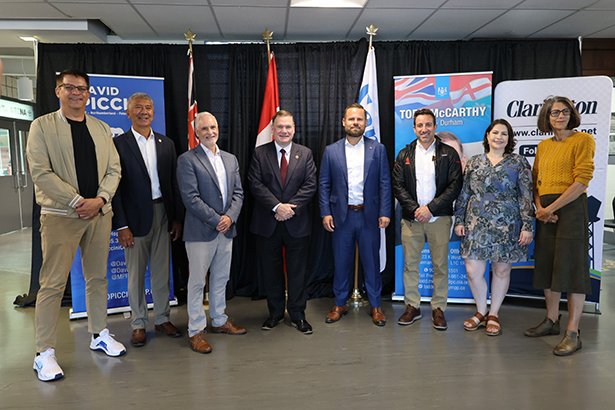 (Pictured left to right): Lloyd Rang, Councillor for Ward 2, Willie Woo, Regional Councillor for Wards 3 and 4, Adrian Foster, Mayor of Clarington, Todd McCarthy, Member of Provincial Parliament for Durham, David Piccini, Member of Provincial Parliament for Northumerland-Peterborough South, Sami Elhajjeh, Councillor for Ward 1, Corinna Traill, Councillor for Ward 3, and Margaret Zwart, Councillor for Ward 4. 