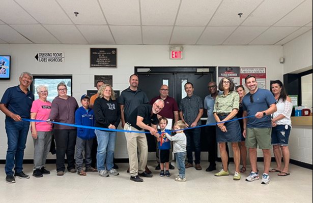 Mayor Foster, Members of Council and Clarington residents cut the ribbon to reopen the Orono Arena.